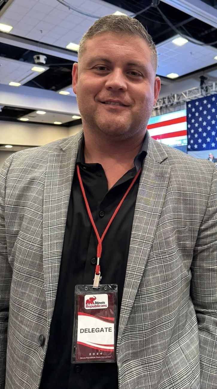 Cody Rose wearing a delegate badge at the 2024 Illinois Republican State Convention.